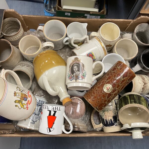Mixed lot of vintage ceramic cups including Queen Elizabeth Jubilee designs.