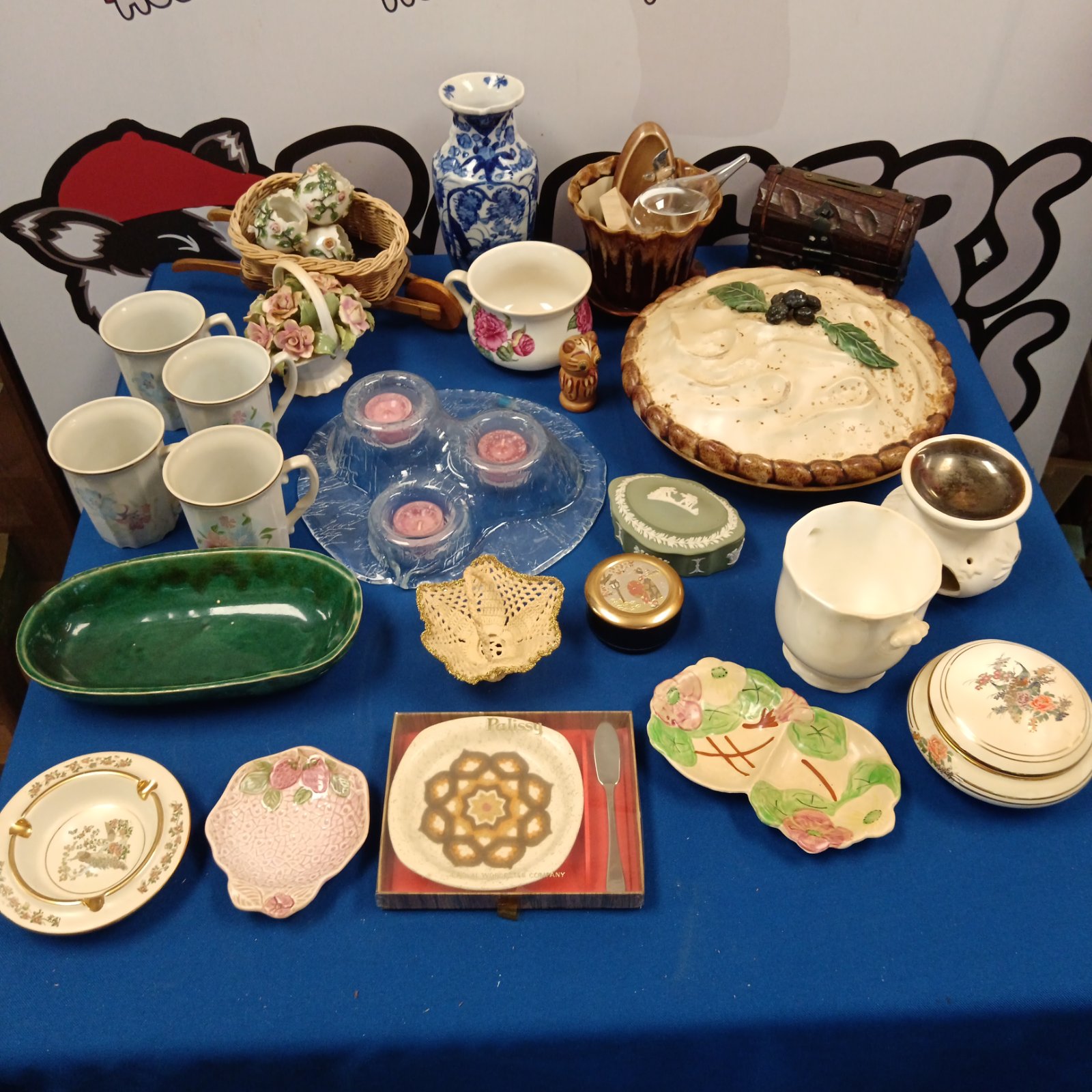 Mixed china and glassware lot with Icelandic candle holder.