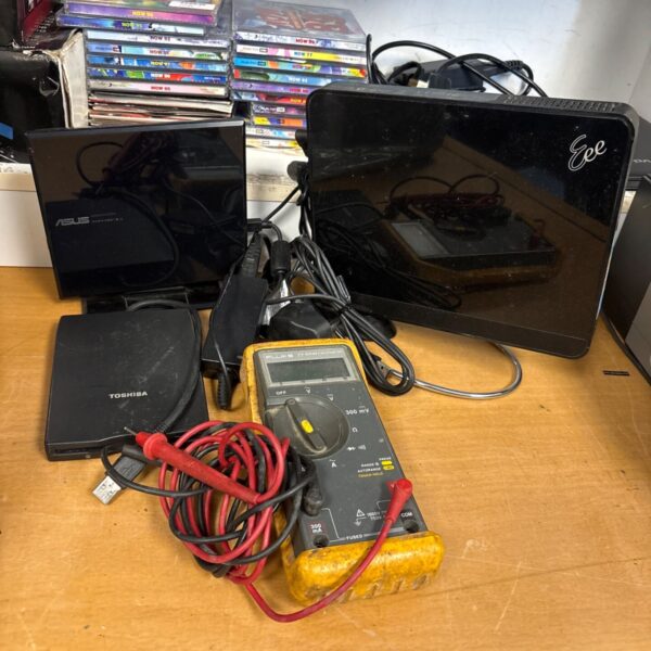 Mixed electrical lot featuring an EeeBox B202 and various components.