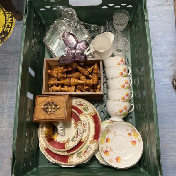 Mixed lot of vintage bone china, chess pieces, and crystal glasses.