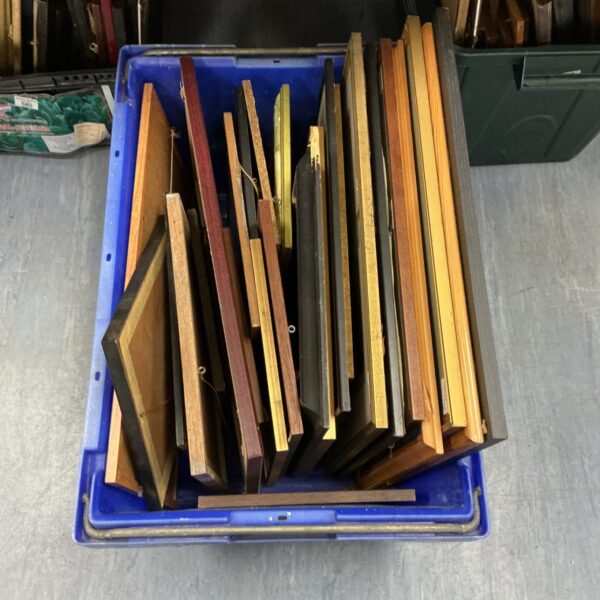 Large lot of mixed picture frames with artwork inside.