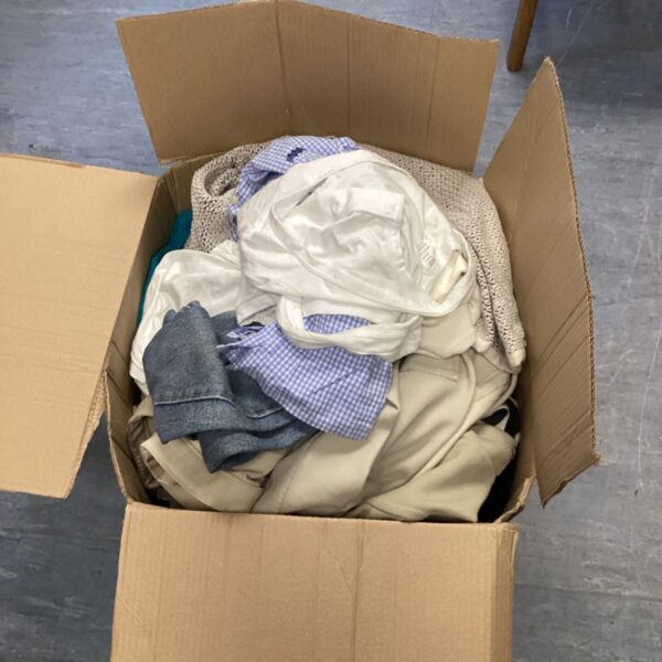 Job lot of mixed textiles including checked shirts and fabric pieces.
