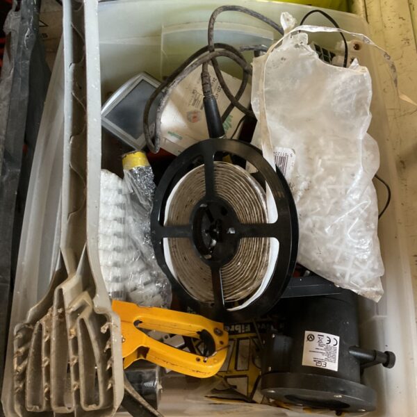 Mixed tool lot with stapler, electrical connectors and TomTom device.