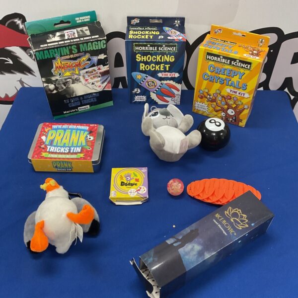 Mixed toy lot featuring Marvin's Magic, Horrible Science, and a prank tin.