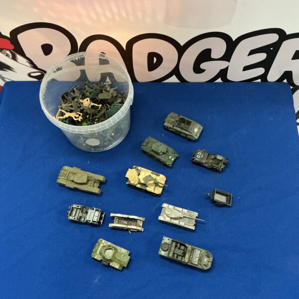 Vintage lot of model soldiers and tanks, including Matchbox vehicles.