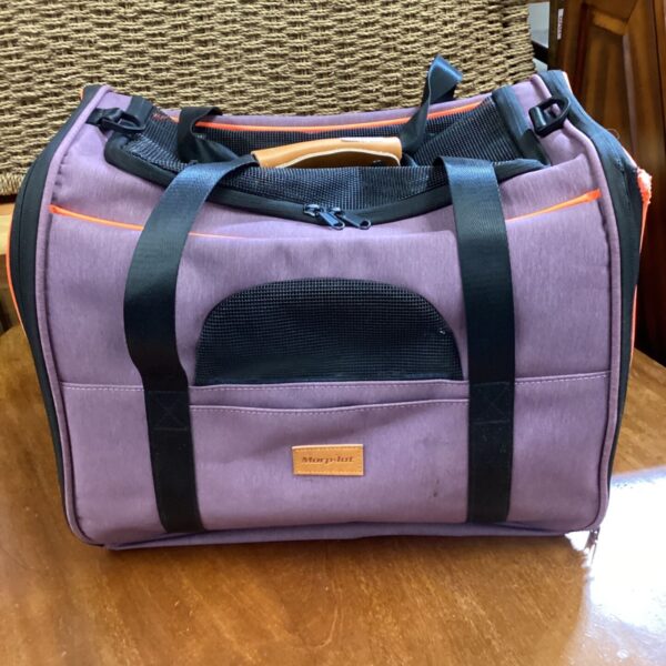 Morpilot pet carrier bag with mesh window and carry handles.
