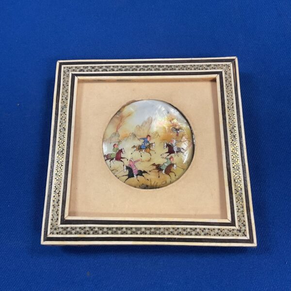 Antique mother of pearl painting depicting a Middle Eastern hunting scene.