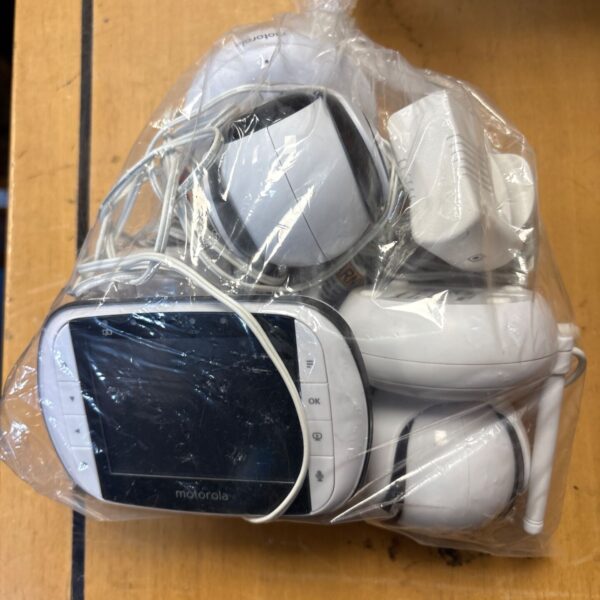 Motorola baby monitor system with handheld screen and camera.