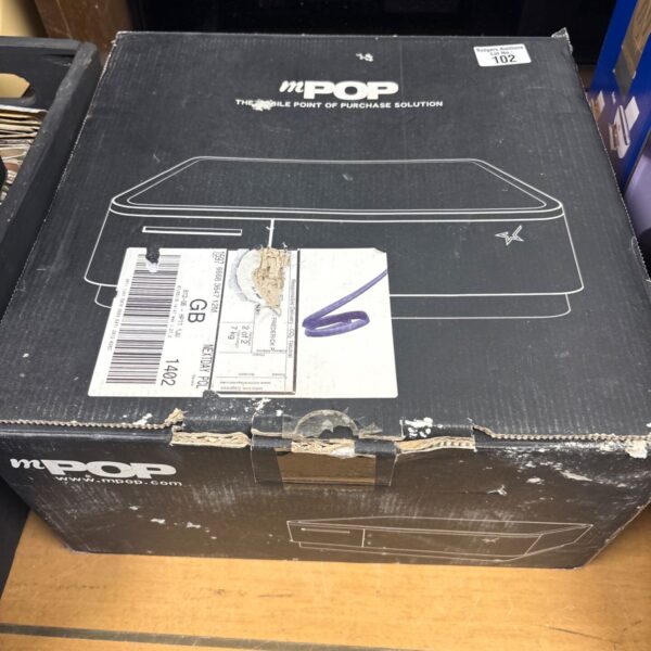 Front view of the mPOP receipt printer in its original box.