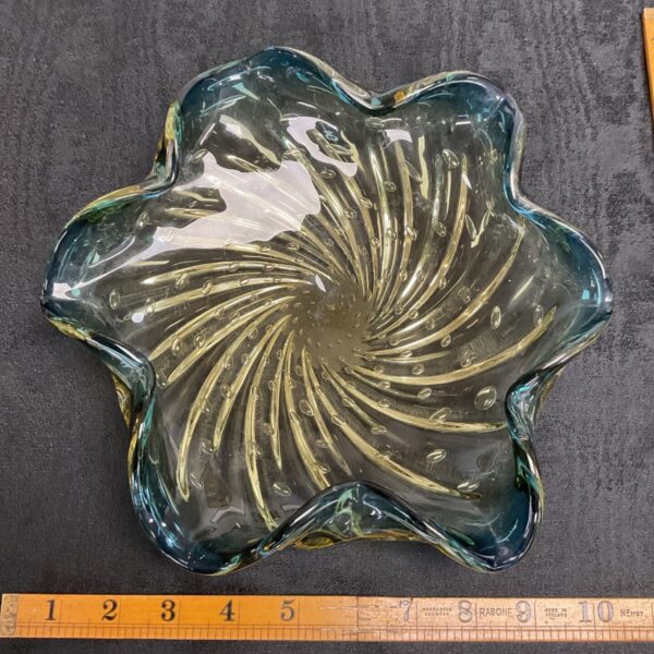 Stunning Murano glass bowl with starburst design and blue amber hues.