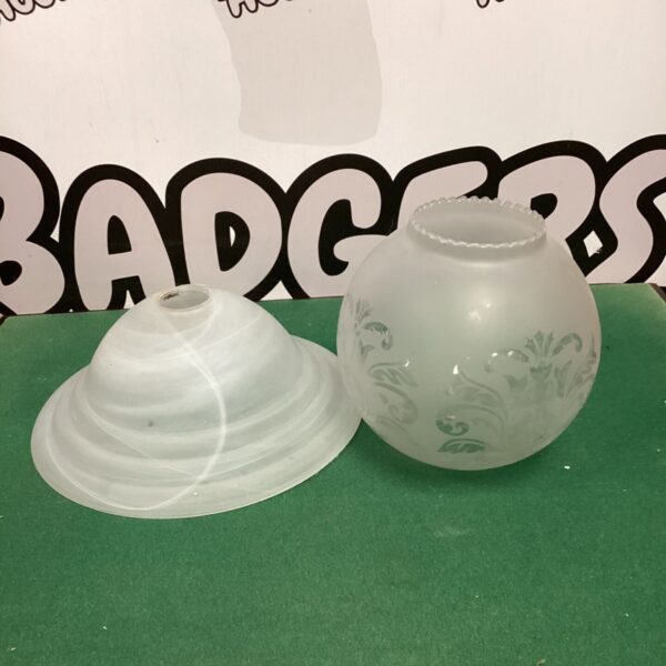Vintage Murano glass lamp shade with swirling design.