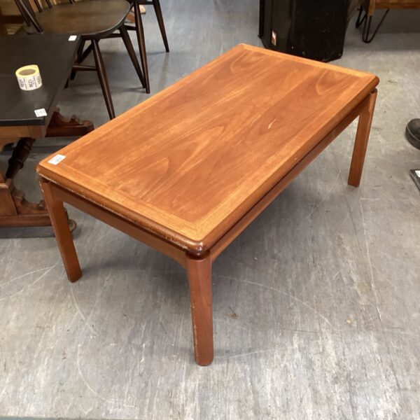 Vintage Nathan coffee table in teak, needing restoration.