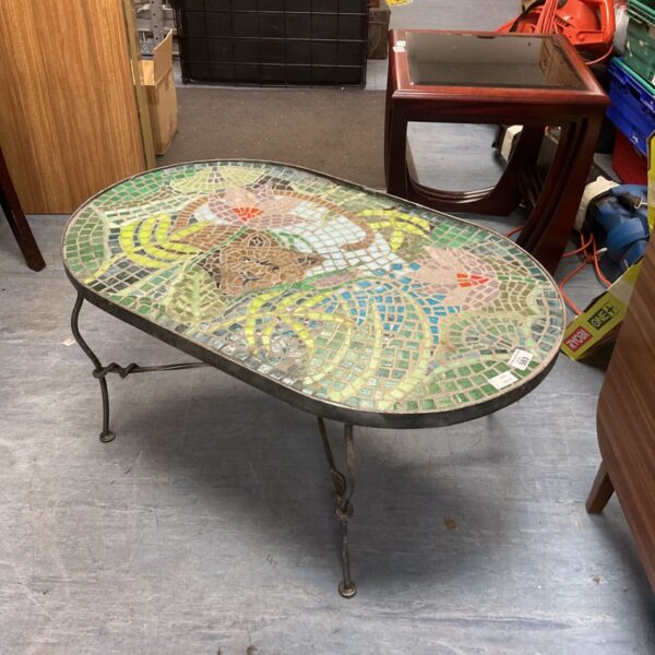 Mid-century modern Neille Olson mosaic coffee table with floral design.