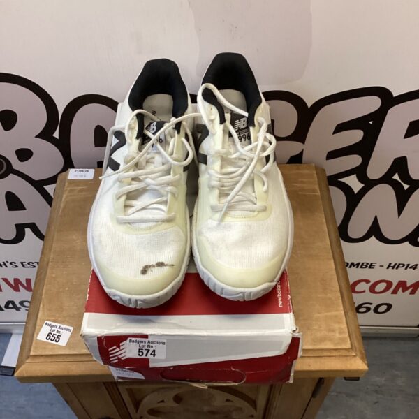 New Balance trainers size 8.5, athletic running shoes.