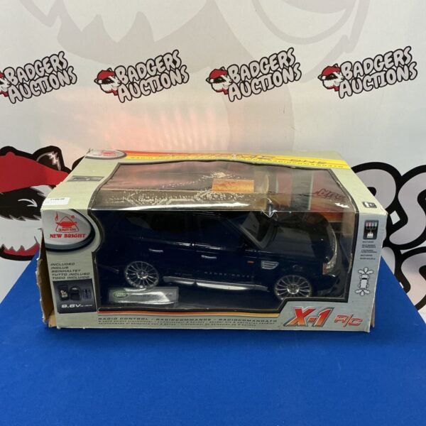 New Bright X-1 RC Range Rover toy car in box.