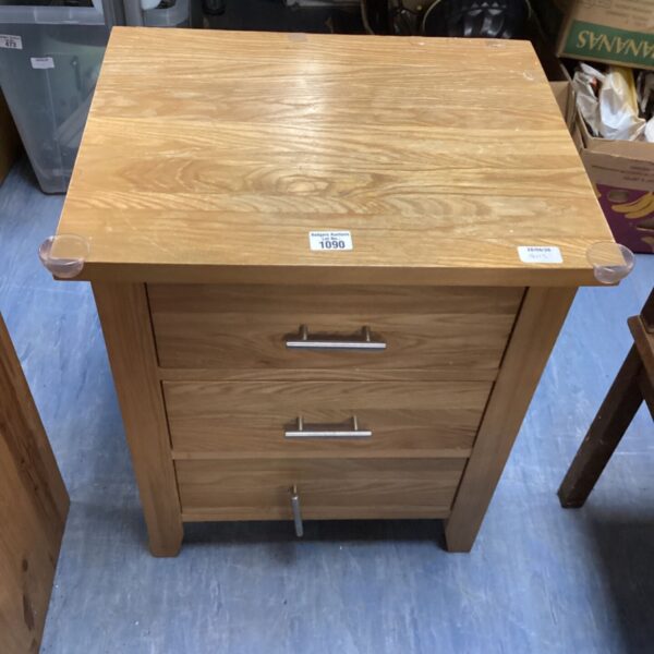 Vintage oak bedside cabinet with drawer and cupboard, ideal for bedroom storage.