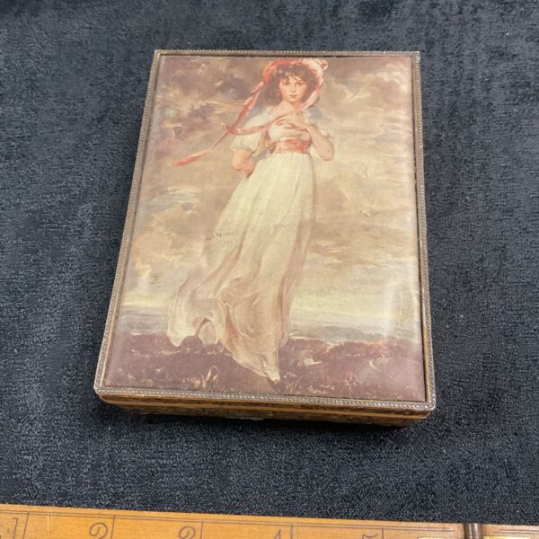 Vintage Oppenheimer London cigarette box with silk portrait lid.