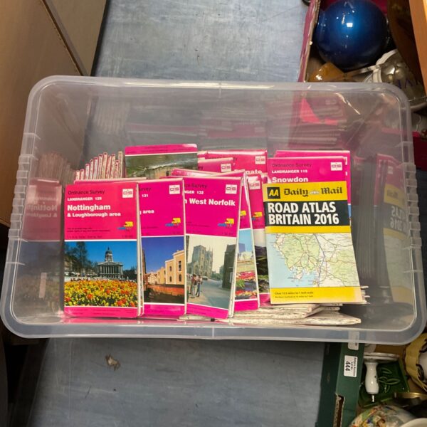 Large box filled with a collection of Ordnance Survey maps.