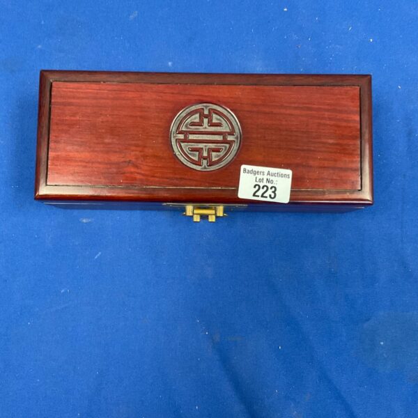 Antique oriental jewellery box with circular design and working clasp.