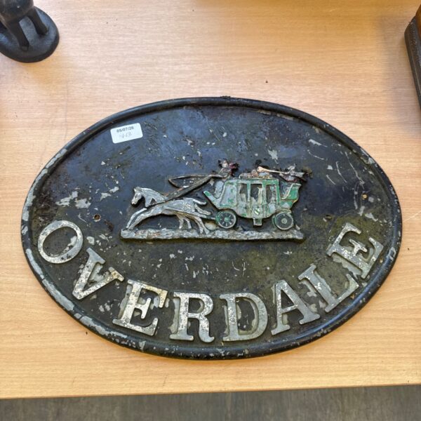 Vintage Over Dale house sign with wagon and horse detail.