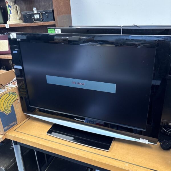Panasonic Viera PX-32LXD85 32 inch LCD television with remote control.