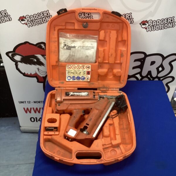 Orange Paslode electric nail gun in a carrying case.
