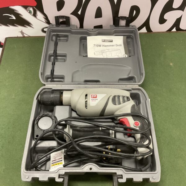 Performance 710w hammer drill in a hard case.