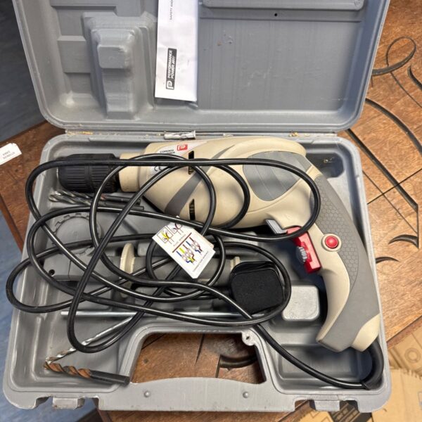 Performance Power PHD710 hammer drill in carrying case.
