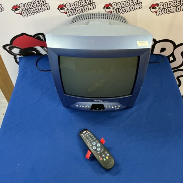 Vintage Philips Turbo Drive TV with remote control.