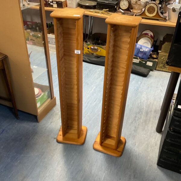 Vintage pine CD storage units for media collection.