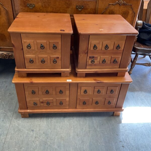 Vintage pine coffee table with drawers and matching side tables.