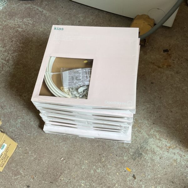 Job lot of plastic curtain coil track for window dressings.