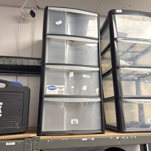 Black plastic storage drawers unit for organization.