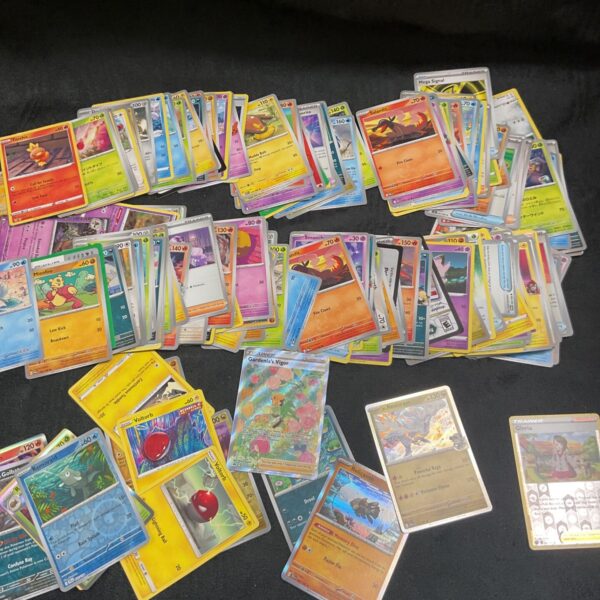 Assorted Pokemon cards from a trading card game collection.