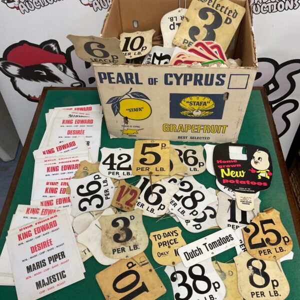 Large collection of vintage predecimal price tags for fruit and vegetables.
