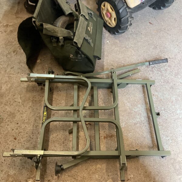Prestige carp fishing barrow with pneumatic tyres and canvas bag.
