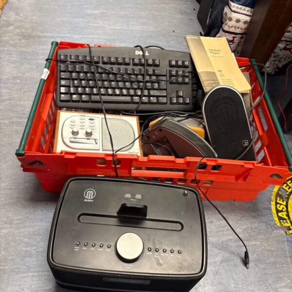 Vintage Pure One radio in a crate of electronics.