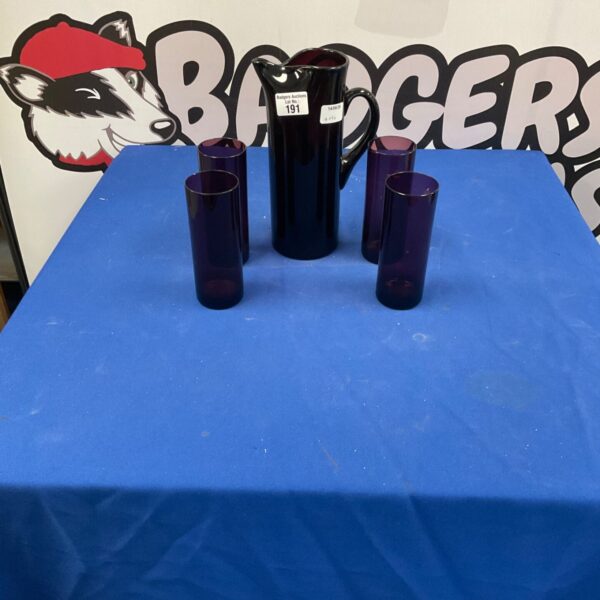 Vintage purple glass jug and four matching glasses set.