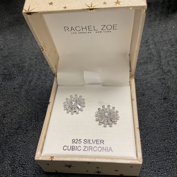 Silver Rachel Zoe starburst earrings in original presentation box.
