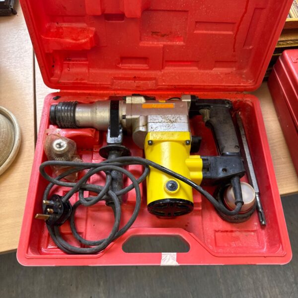 Ral-craft electric SDS drill in a red case.