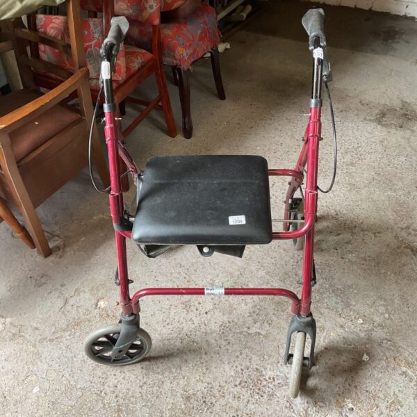 Red Humber Mobility rollator walking aid with a padded seat.