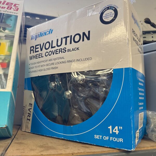 New set of Revolution 14 inch wheel trims in original packaging.