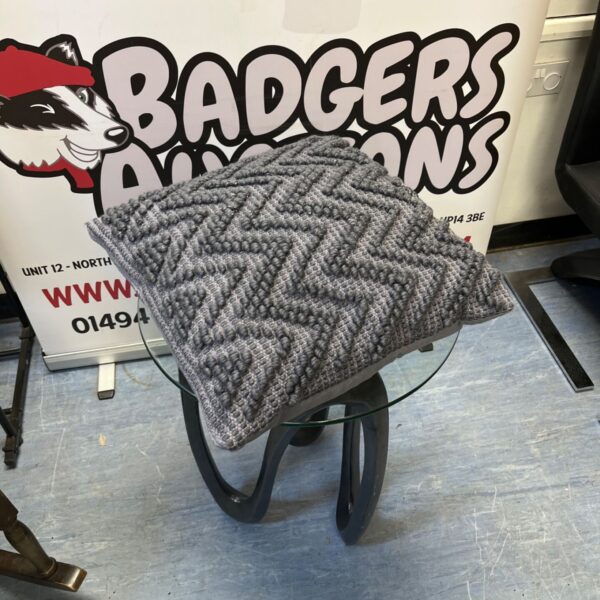Grey chevron Riva Paoletti Scandium cushion with textured bobble detail.