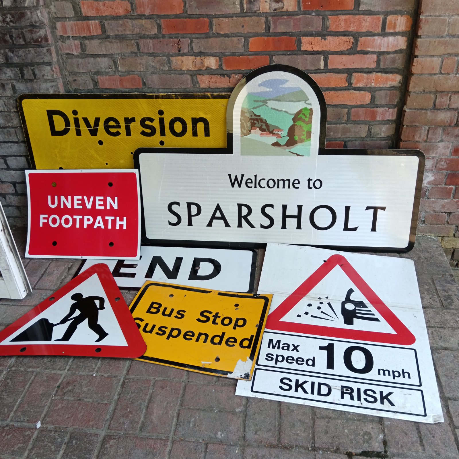 Lot of vintage road signs including a diversion sign.