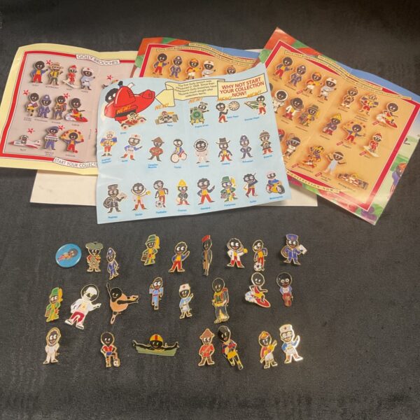 Vintage Robertson Golly badges collection with paperwork.