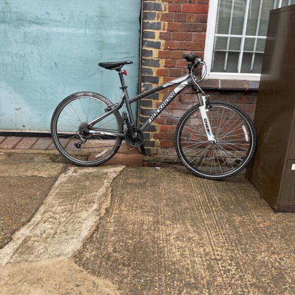 Used Rockrider 5.1 mountain bike in outdoor setting.