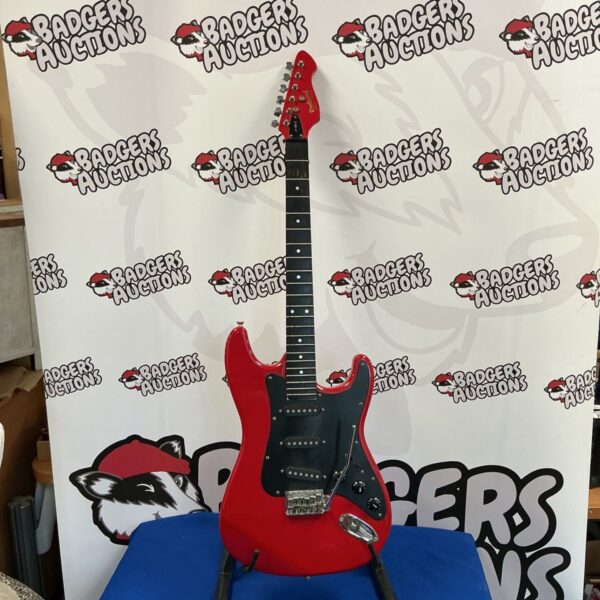 Red Rockwood Hohner LX100G electric guitar needing strings.