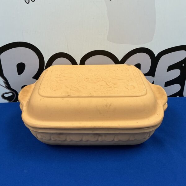 Vintage Romertopf clay roasting dish for slow cooking.