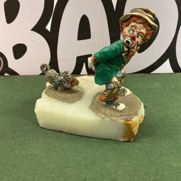 Vintage Ron Lee clown figurine with colourful details.