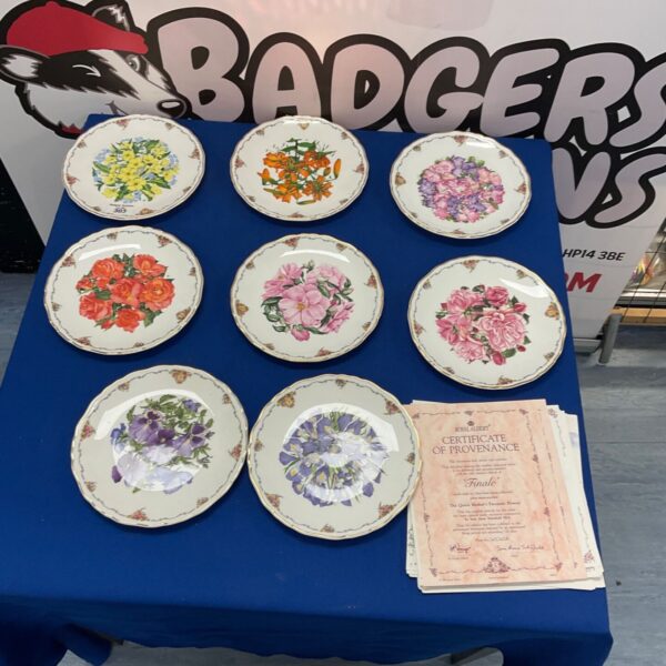 Vintage Royal Albert china plates with floral designs, HP14 pattern.